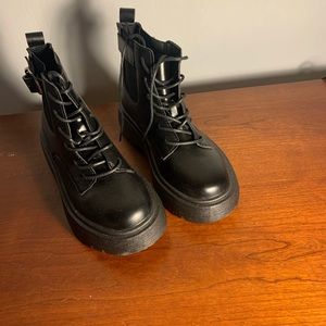 Size 7.5 women’s boots. Never worn.